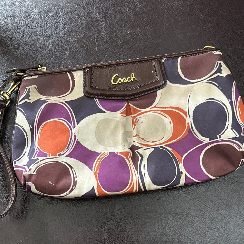Coach Purple and Orange Clutch with Circular Pattern
